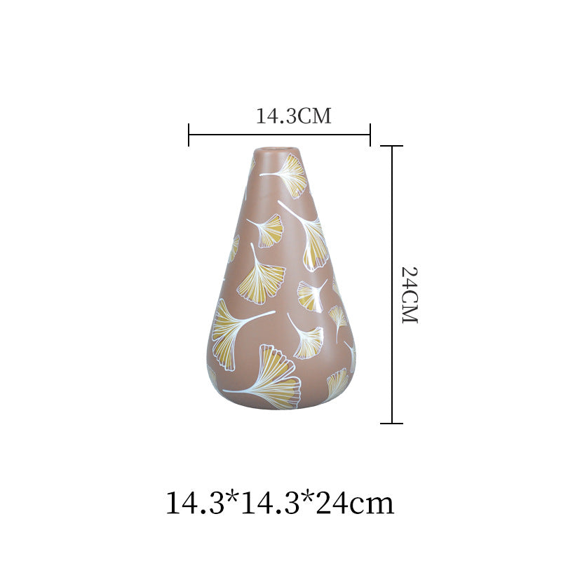 Decorative vase with floral patterns and dimensions on a white background