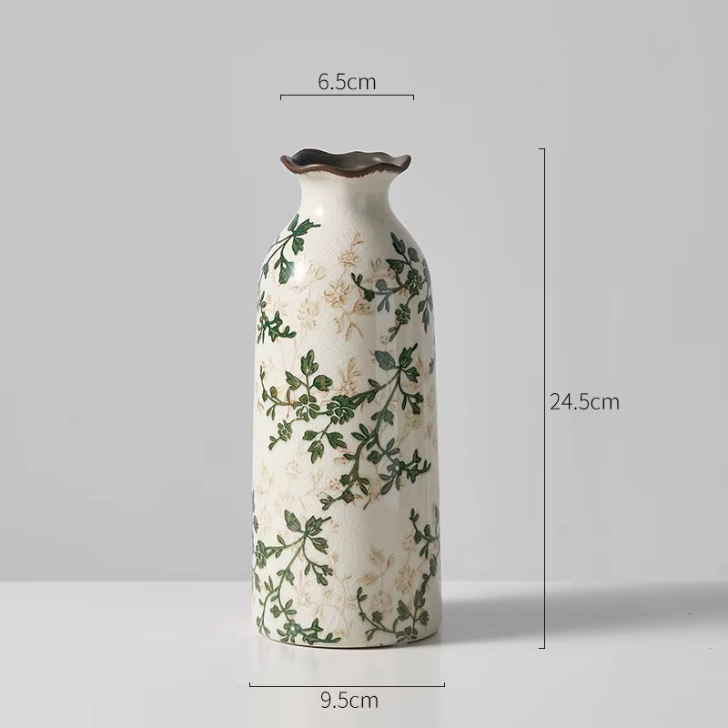 Ceramic vase with floral patterns and dimensions on a gray background