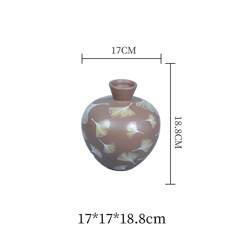 Ceramic vase with floral patterns and dimensions on a white background