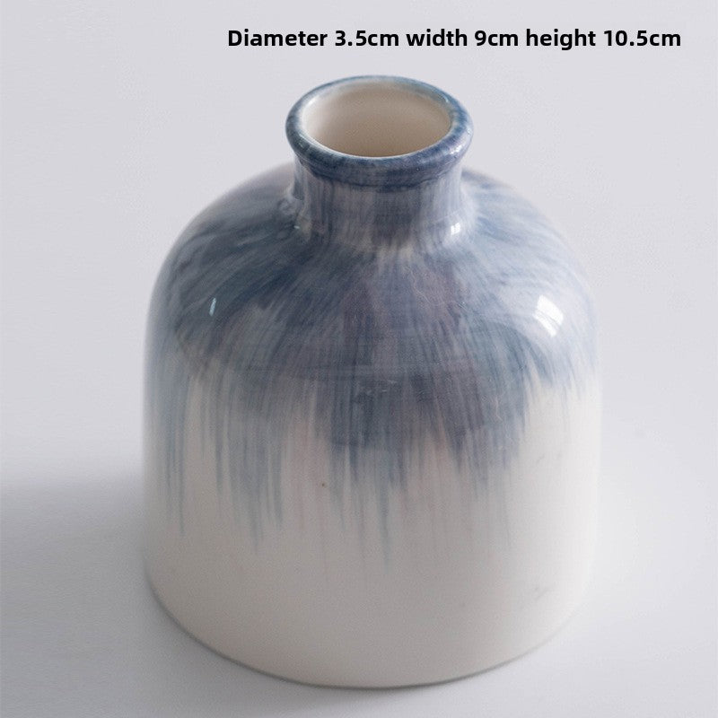 White vase with blue gradient on a white background