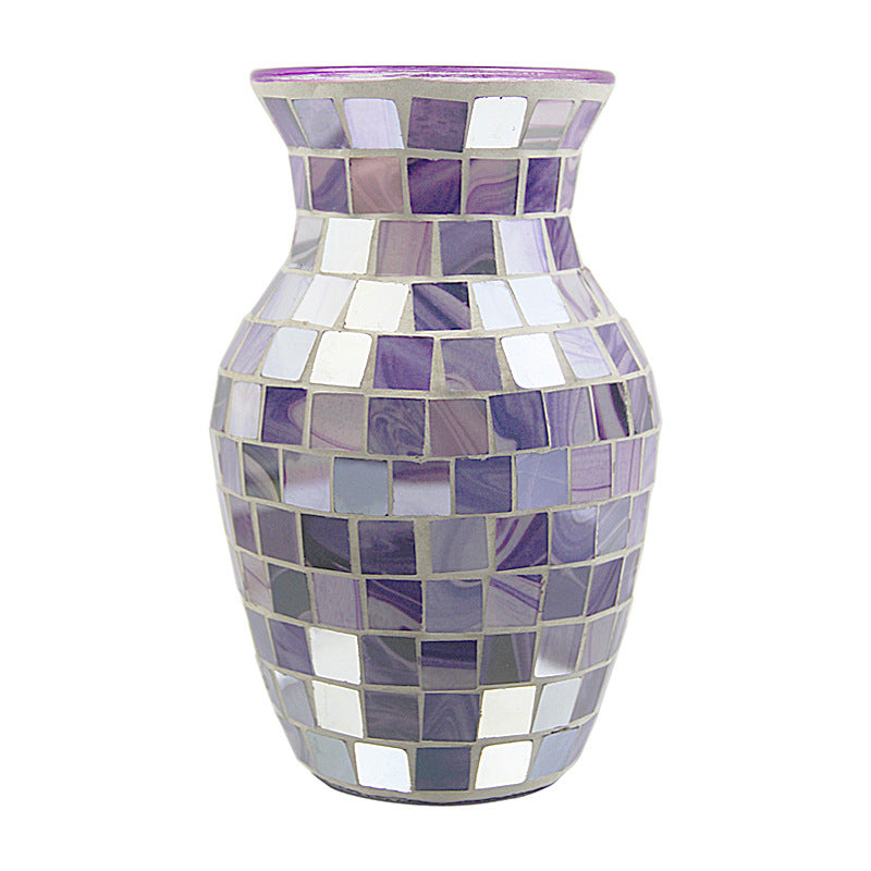 Mosaic vase with purple and white tiles on a white background