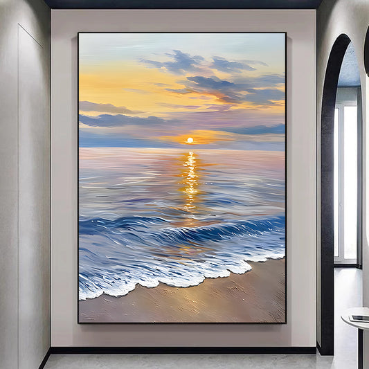 Framed artwork of a sunset over the ocean in a modern interior setting.