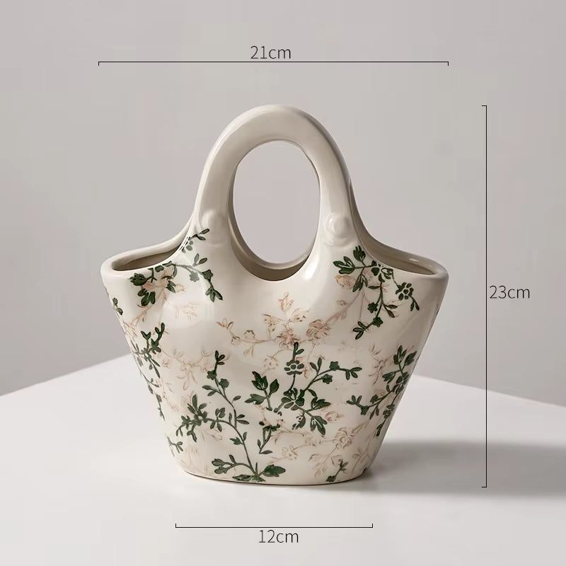 Ceramic tote bag with floral pattern and measurements on a light gray background