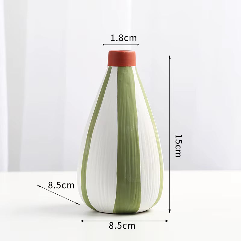 Green and white vase with dimensions labeled on a white background