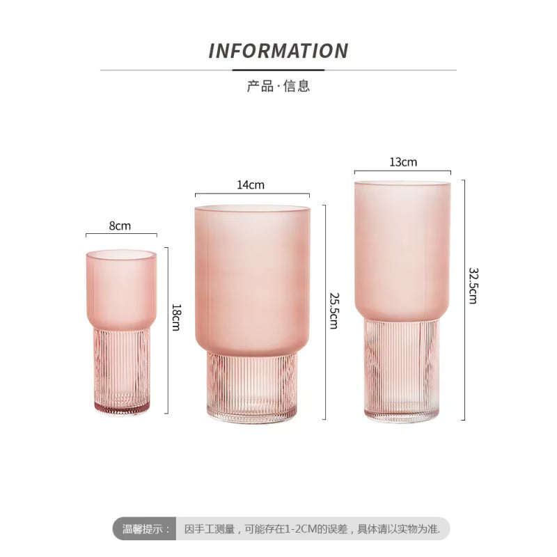 Set of pink glass vases with dimensions on a white background