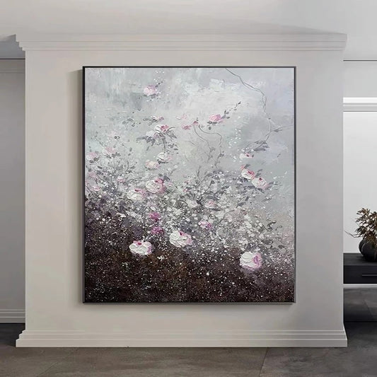 Abstract painting with floral elements on a wall in a room.