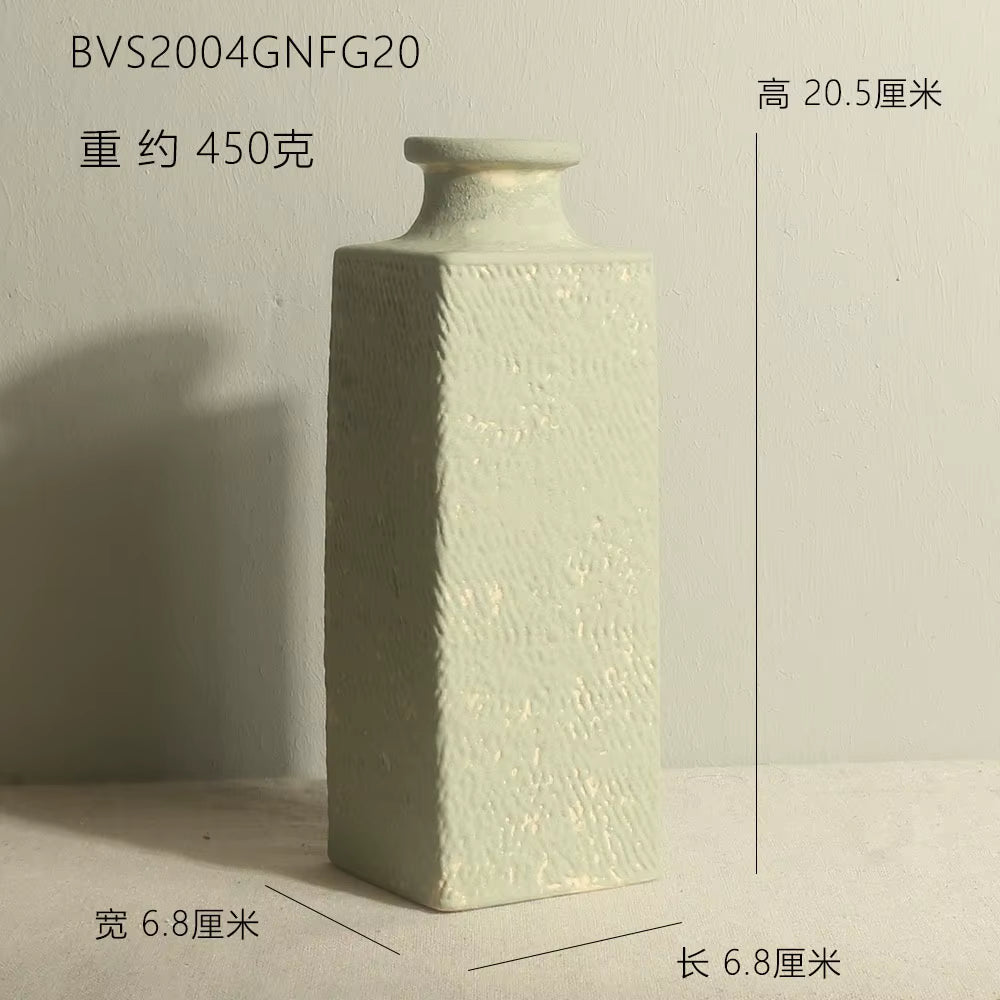 Textured square vase on a neutral background with measurements