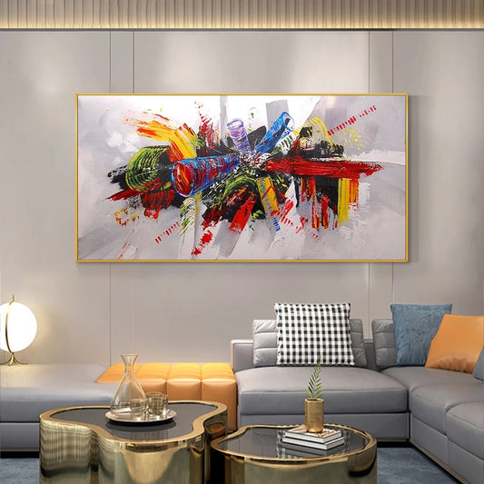 Modern living room with a colorful abstract painting on the wall, gray sofa, and decorative items.
