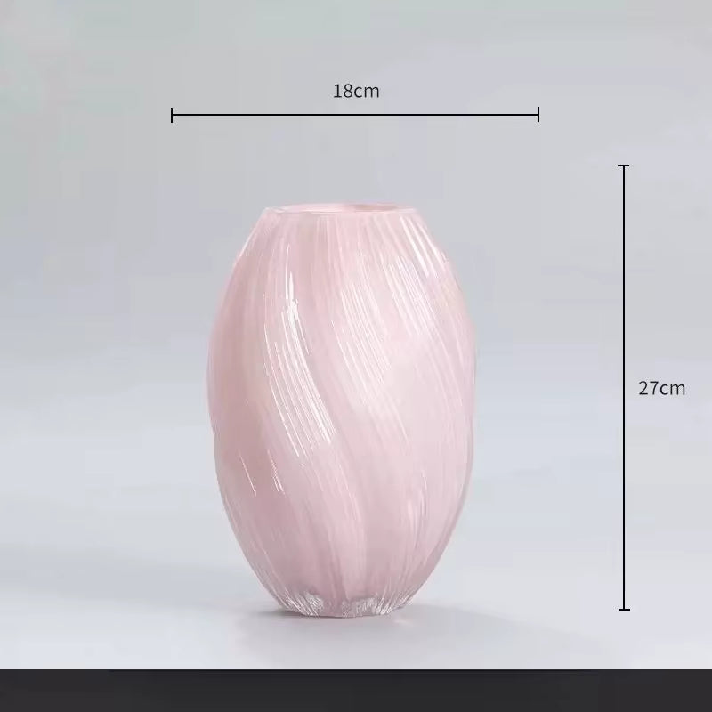 Pink vase with measurements on a gray background