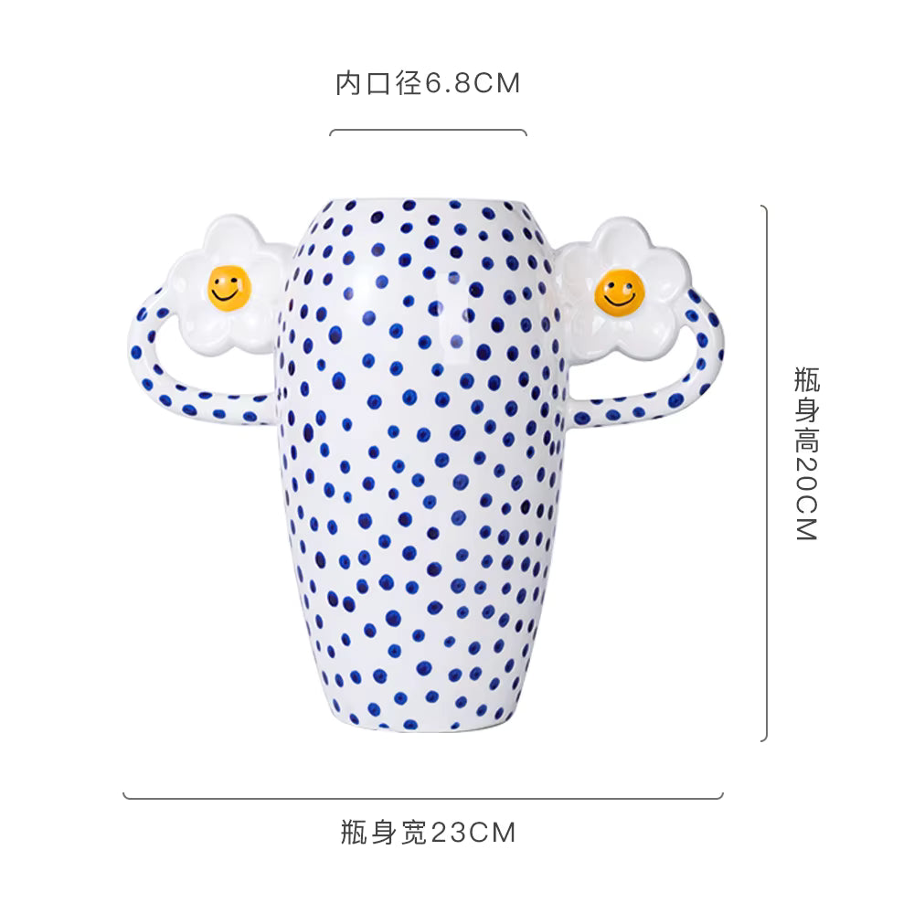 Polka dot bottle with cartoon faces on a white background