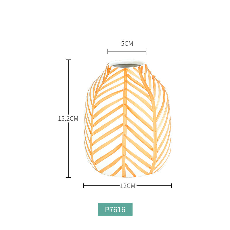 Measurement chart of a cylindrical object with chevron pattern, showing dimensions on a white background.