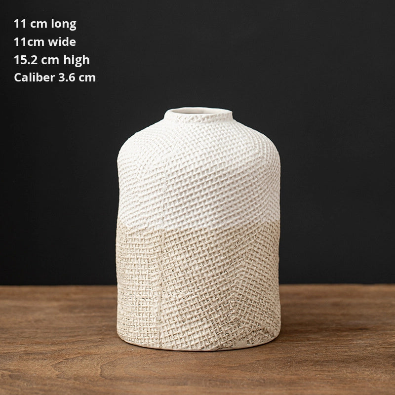 Textured vase on a wooden surface with dimensions displayed