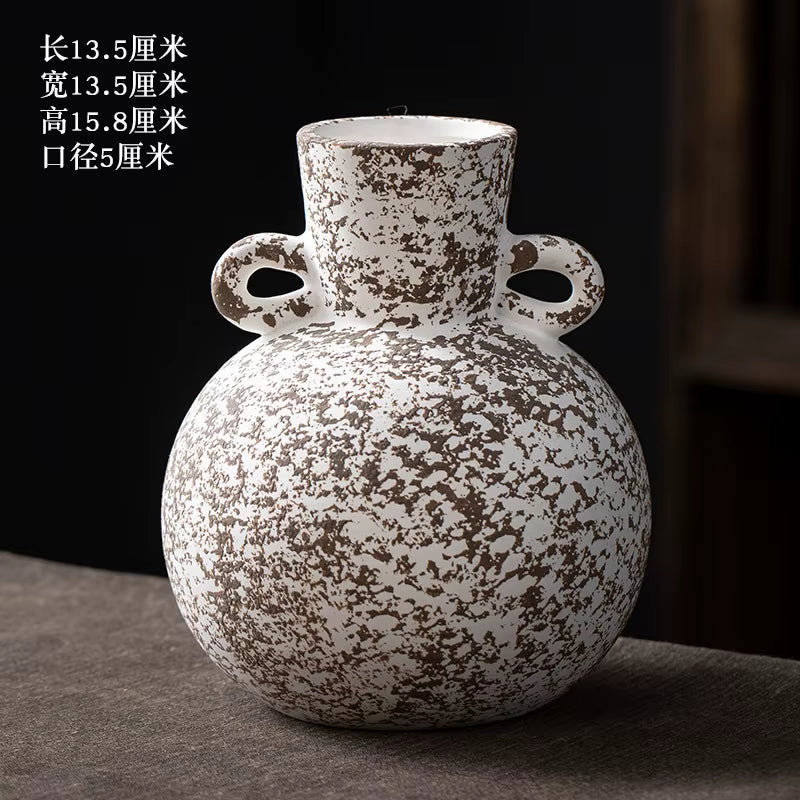 Ceramic vase with textured surface on a dark background