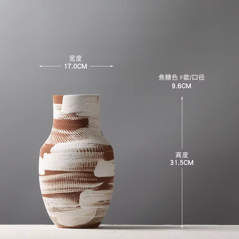 Ceramic vase with brown and white patterns on a gray background, showing measurements.