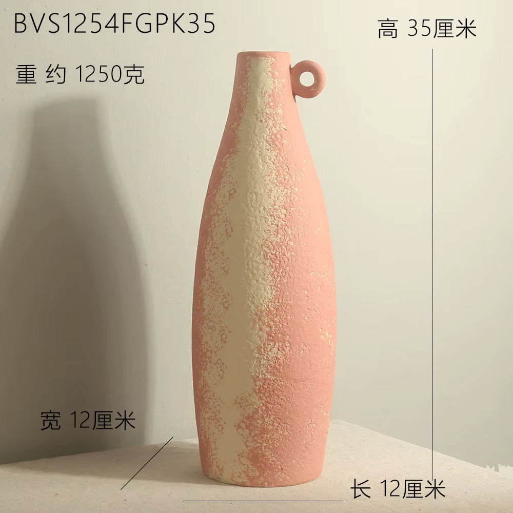 Pink and beige textured vase on a light background with measurements indicated.