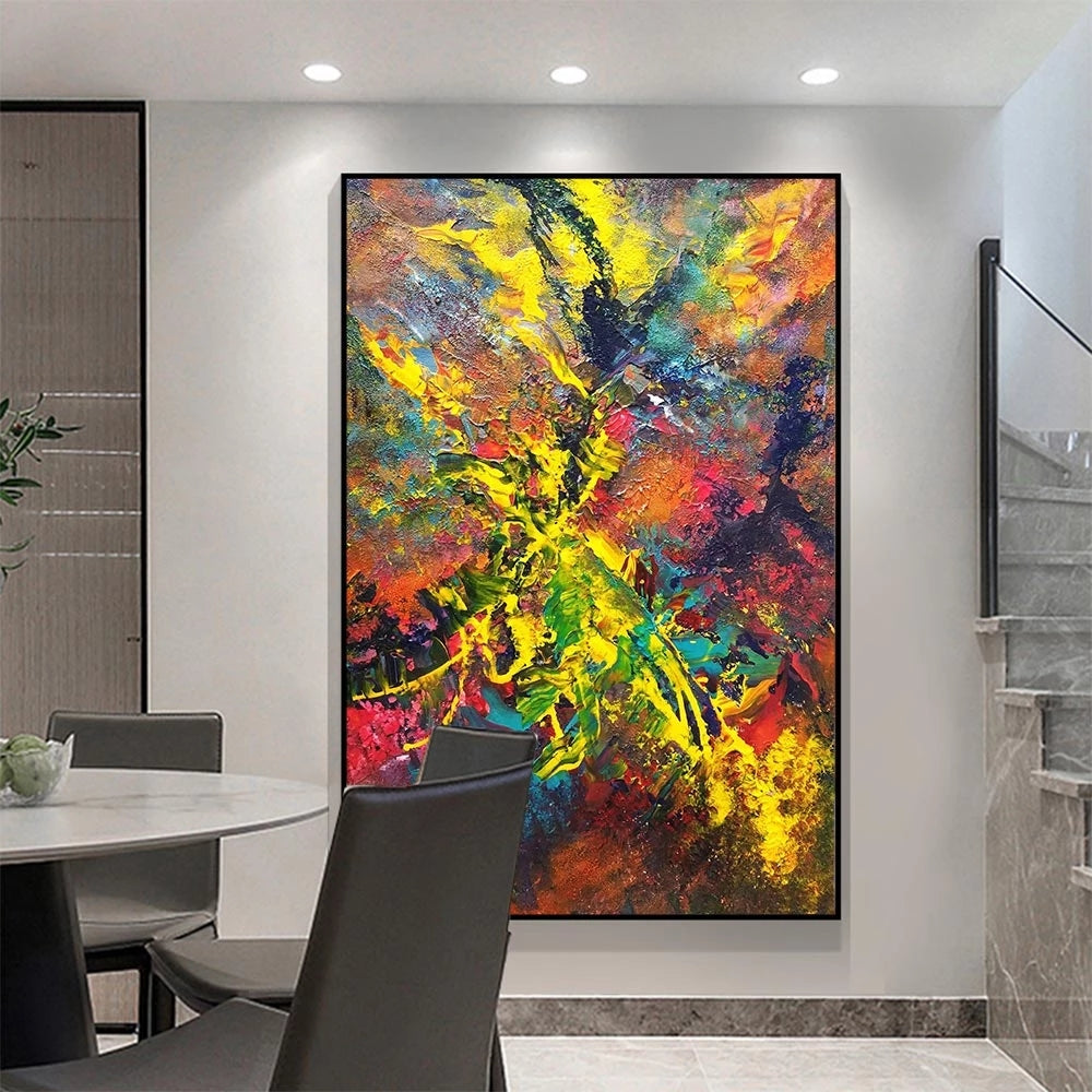Colorful abstract painting in a modern interior setting with a dining table and chairs.