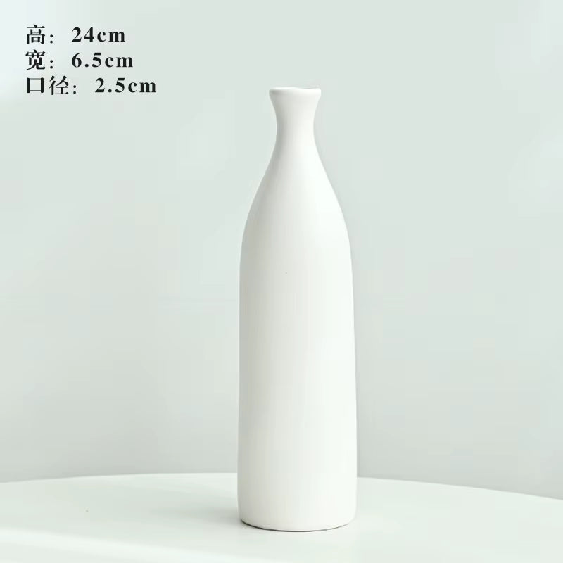 White ceramic bottle on a light gray background with dimensions displayed.