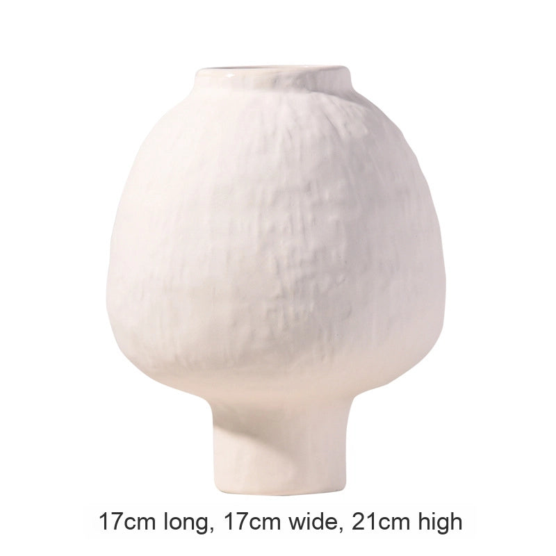 White ceramic vase on a white background with dimensions displayed.