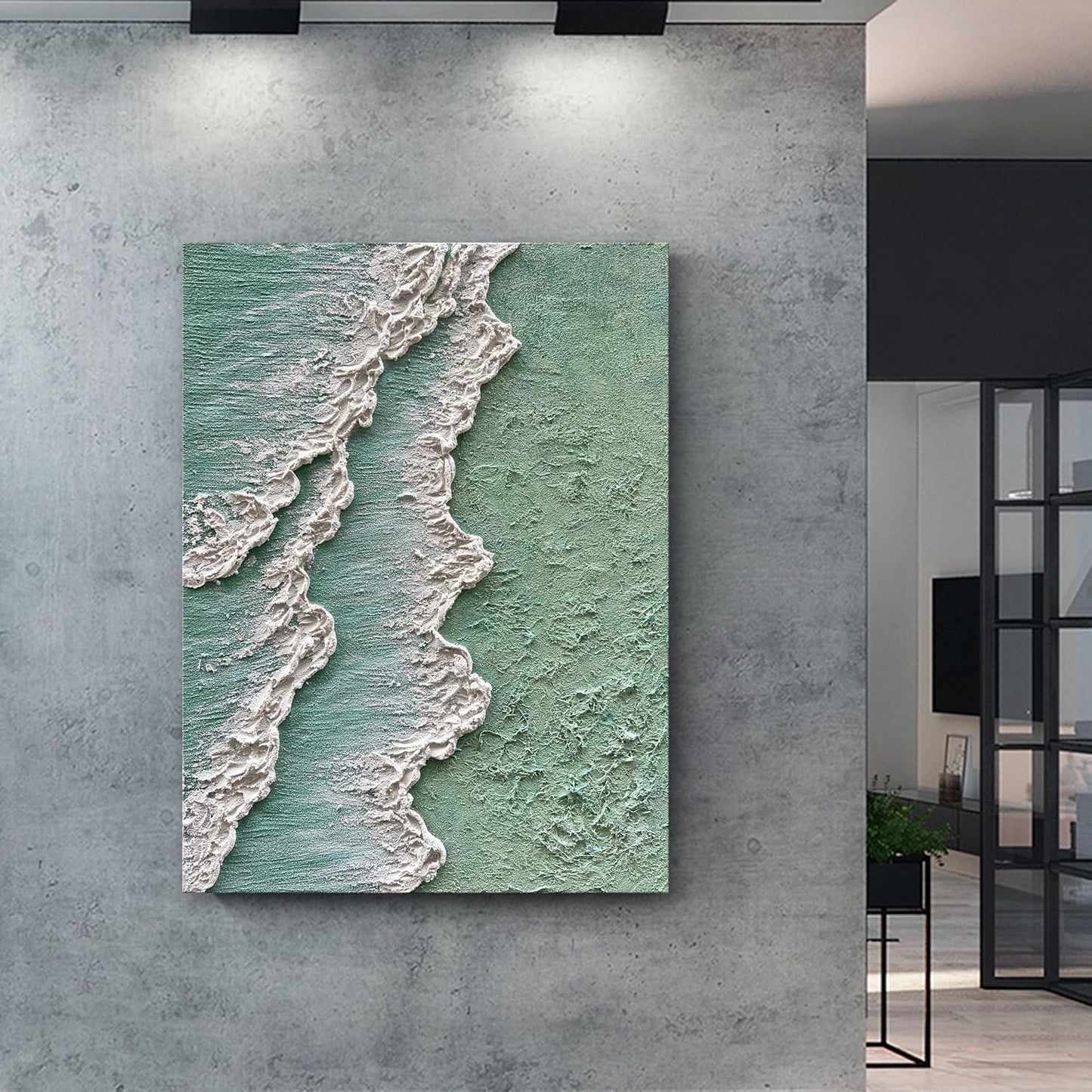 Textured wall art of a beach scene on a gray wall