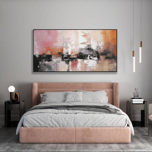 Modern bedroom with a pink bed, abstract painting, and side tables.