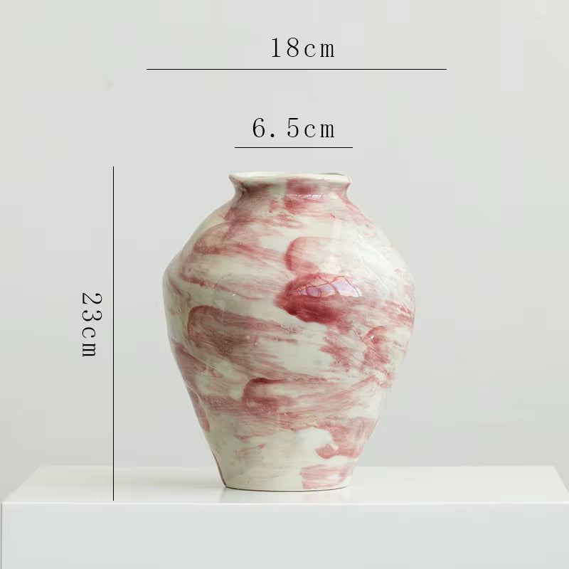 Marble-patterned vase with dimensions on a white background