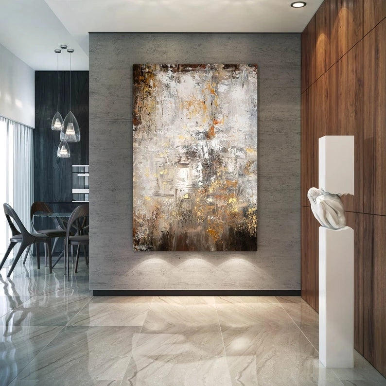 Modern interior with abstract painting on a wall, chairs, and a table.
