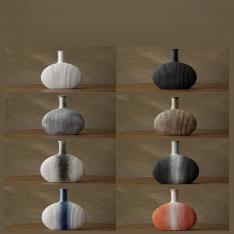 Collection of variously colored textured vases on a wooden shelf against a brown background