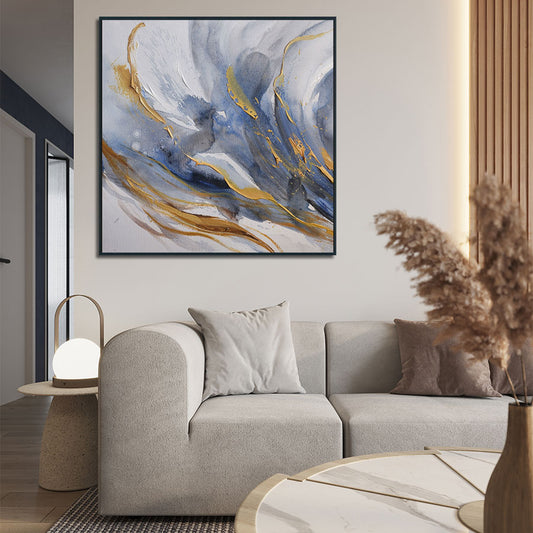 Living room with a gray sofa, abstract painting, and decorative elements.