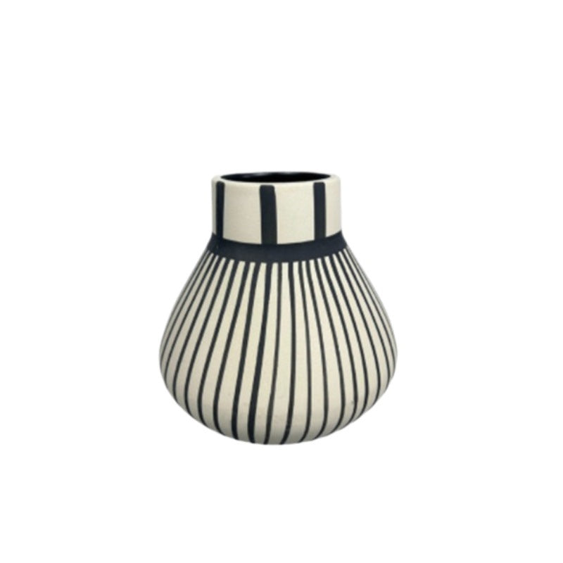 Striped vase with black and white pattern on a white background