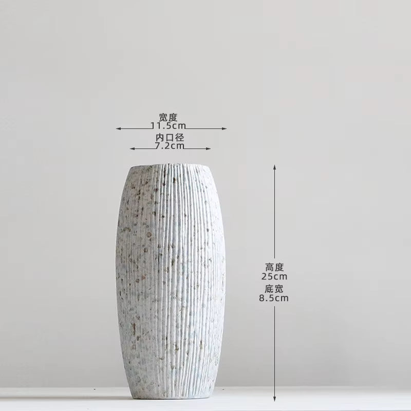 Gray textured vase with dimensions on a white background