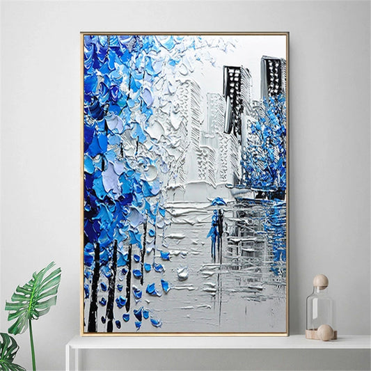 Abstract painting with blue and white colors on a wall