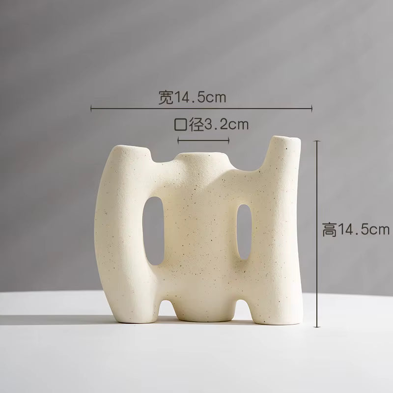 White ceramic vase with dimensions on a gray background