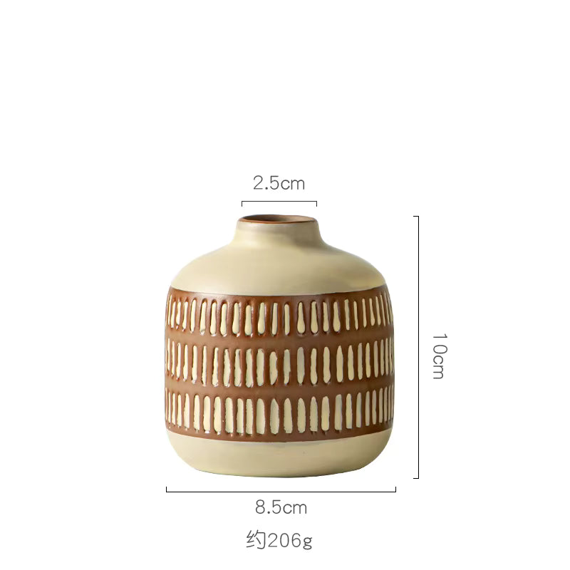 Ceramic vase with decorative patterns and measurements on a white background