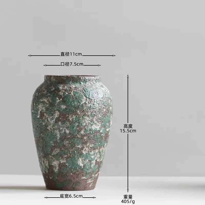 Ceramic vase with dimensions labeled on a gray background