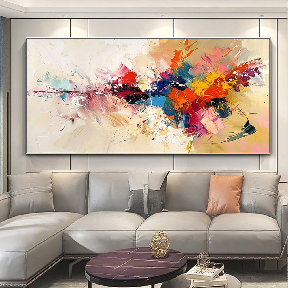 Colorful abstract painting on a wall above a gray sofa in a living room.