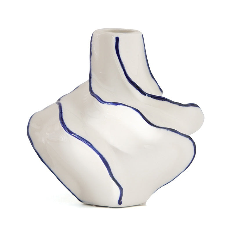 Ceramic vase with blue accents on a white background