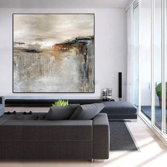 Modern living room with a large abstract painting on the wall.