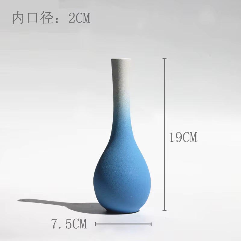 Blue gradient vase with measurements on a white background