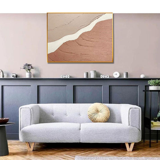 Living room with a gray sofa, abstract painting, and decorative items.