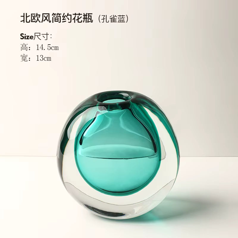 Turquoise glass vase on a white background with text