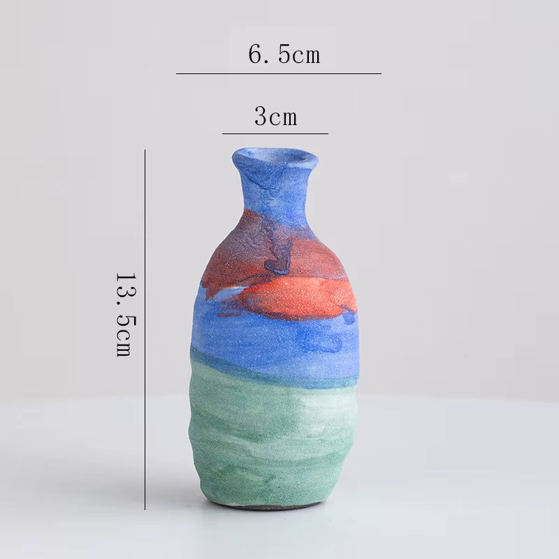 Colorful vase with measurements on a light gray background