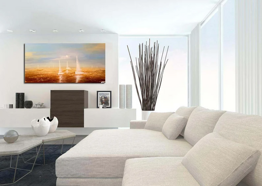 Modern living room with a large TV displaying a nature scene, white sofa, and decorative items.