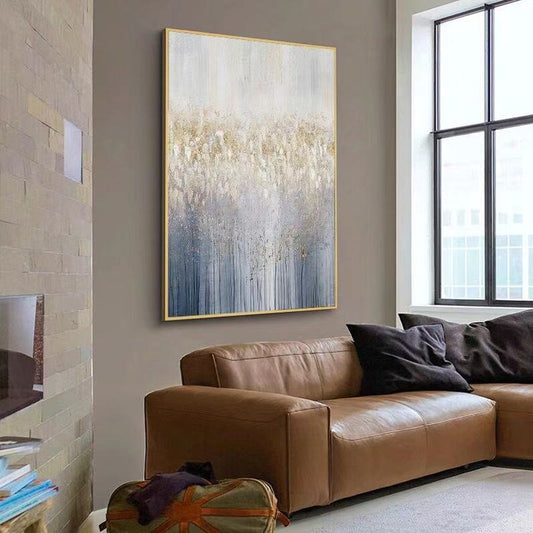 Living room with a brown leather sofa and abstract painting on the wall.
