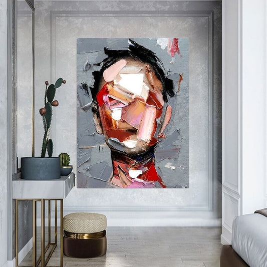 Abstract art painting on a wall in a modern interior setting