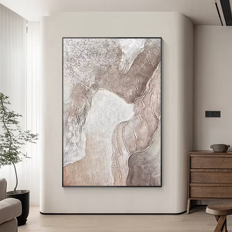 Abstract art piece on a wall in a modern living room