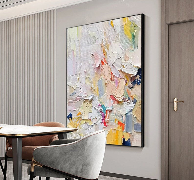 Abstract art painting on a wall in a modern interior setting
