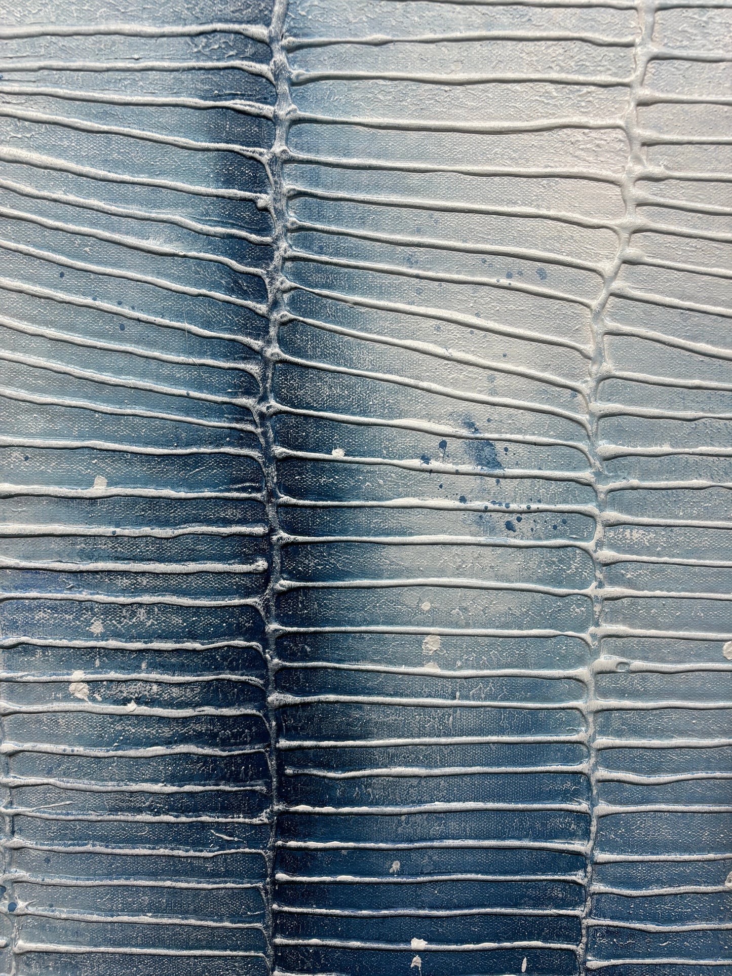 Close-up of textured blue surface with wavy pattern