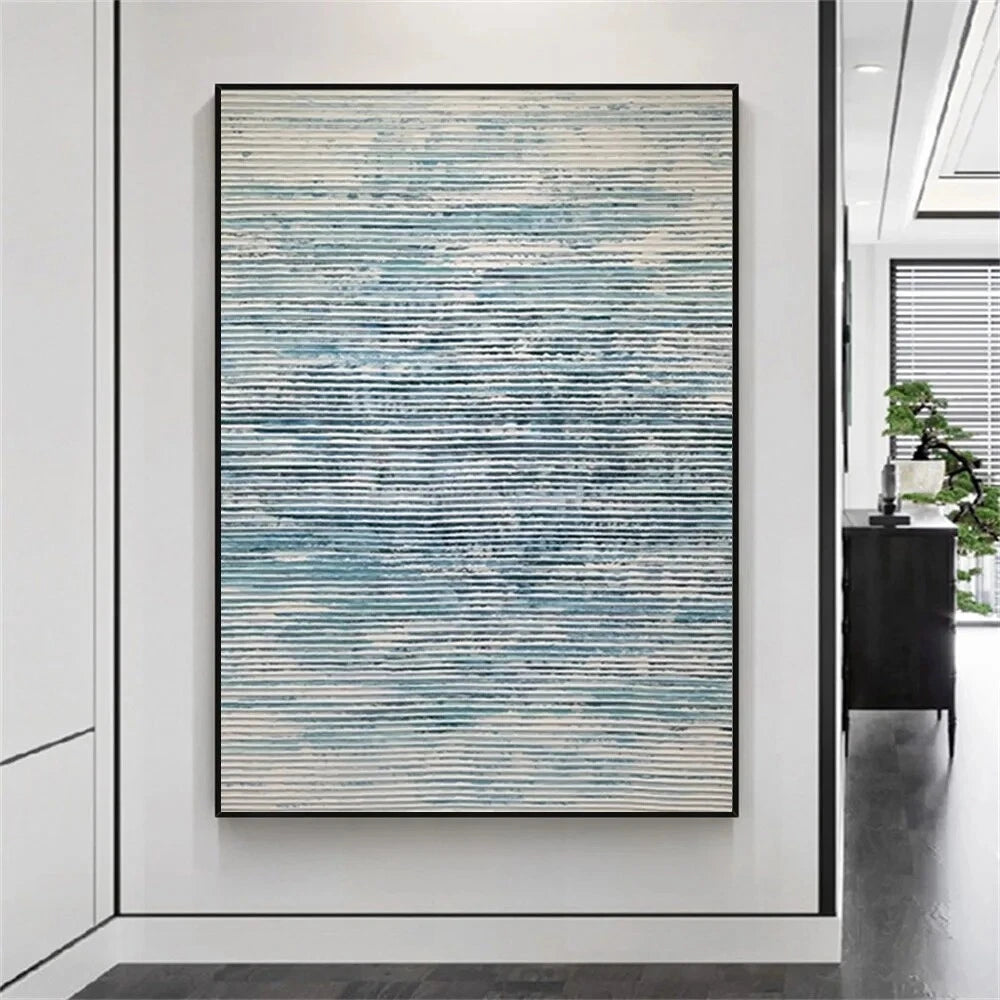 Abstract painting with blue and white stripes in a modern interior setting