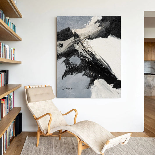 Modern interior with a chaise lounge chair and abstract painting on the wall.