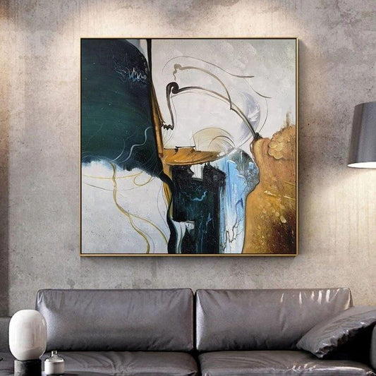 Abstract painting on a wall above a gray sofa
